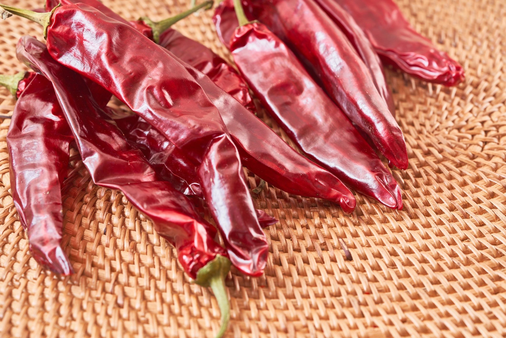 The series captures Korean dried chili peppers, showing bulk sacks at a cooperative, premium whole peppers, chili powder, and seasoning raw chicken.